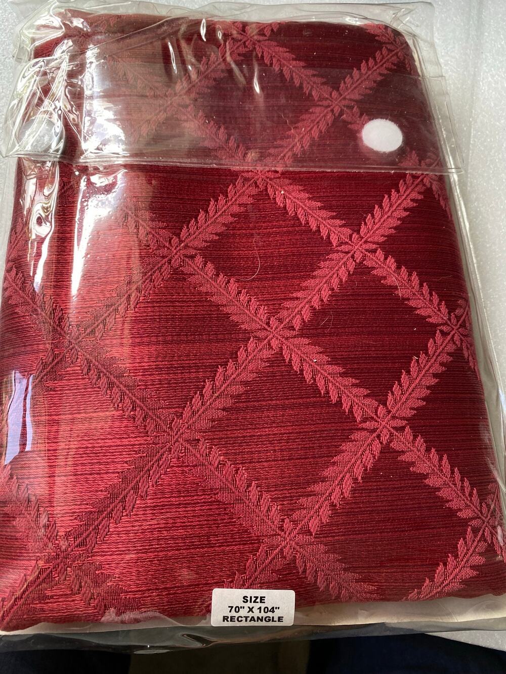 Red or cranberry Lenox Laurel Leaf Damask Tablecloth in a 70" x 104" rectangular